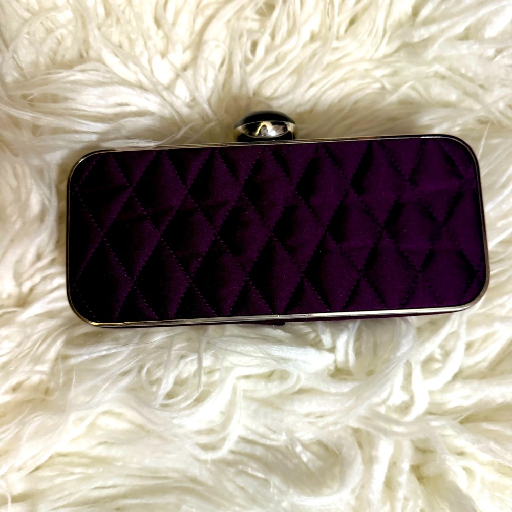 84. Kate Landry Clutch